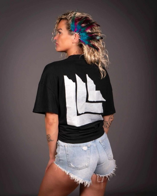 Handgemaakte veren oorhaak fuchsia roze zeegroen handmade feather earcuff festival accessories ibiza style revealed 2